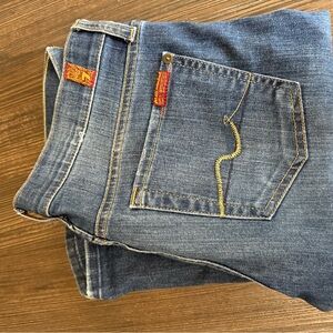 7 For All Mankind Women's Blue Boot Cut Jeans with Yellow Stitching Detail